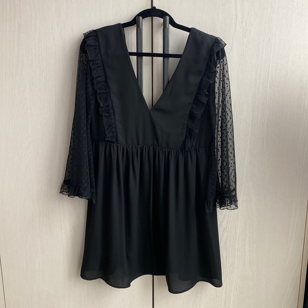 Les Petites polka dot flowy black dress